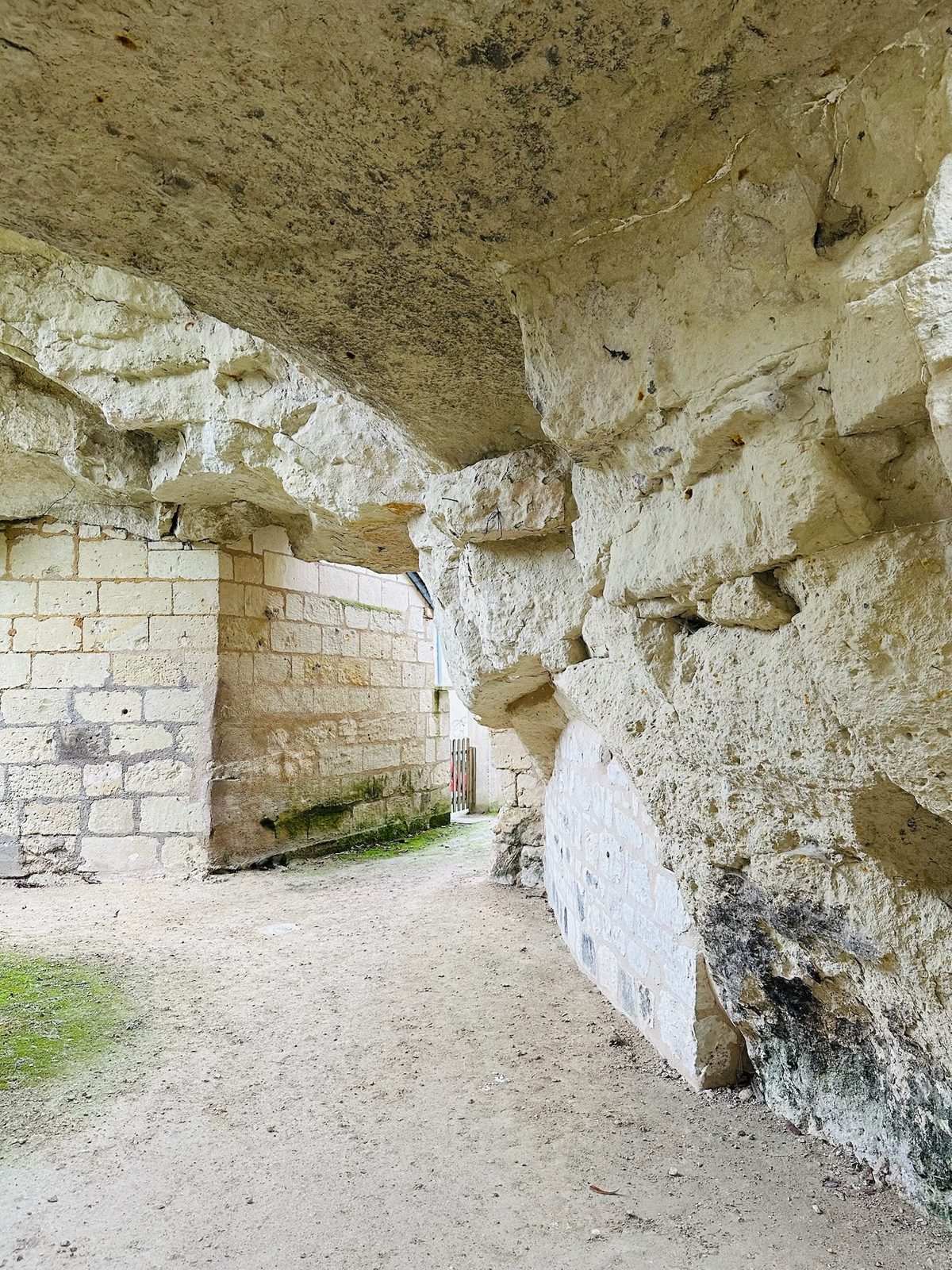 A tuffeau cave in the Loire Valley, daylight reaching the pale limestone